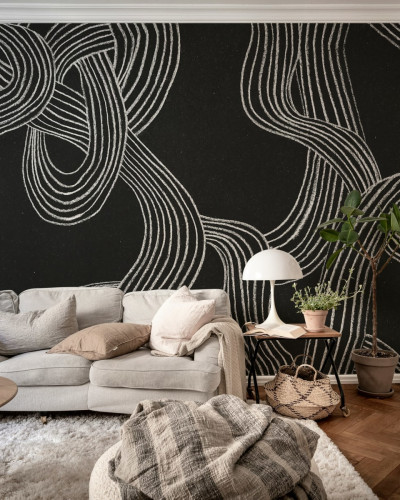 Tapet abstract cu linii albe pe fond negru într-un living modern