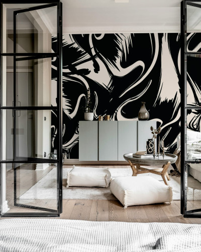 Tapet artistic cu forme negre si albe intr-un living modern.