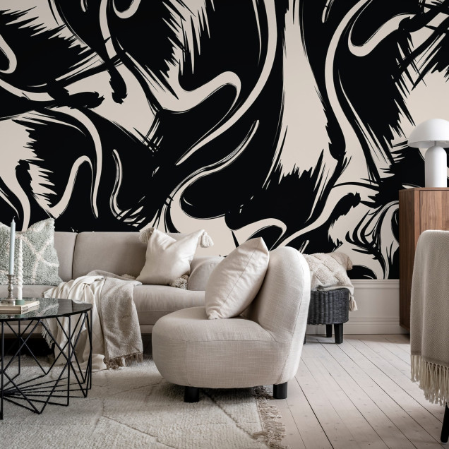 Tapet artistic cu forme negre si albe intr-un living modern.