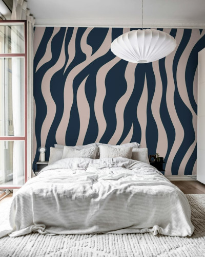 Tapet cu dungi de zebra albastre și roz, Zebra Lines, Blue & Pink, decorat cu un pat alb într-o cameră cu decor modern.