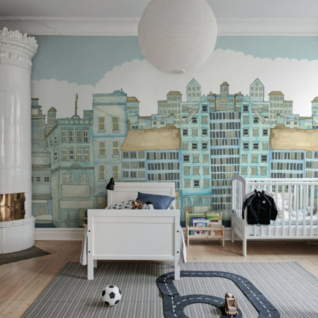 Tapet Funny Houses Light Blue - un design original cu cladiri desenate cu mana, perfect pentru o camera de joaca, un dormitor sau un living.