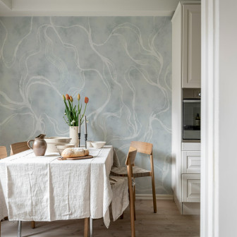 Tapet albastru cu linii curbe într-o sufragerie