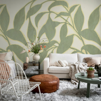 Tapet cu siluete de frunze verzi intr-un living modern