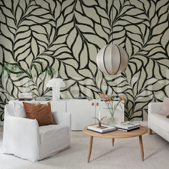 Tapet cu frunze negre stilizate într-un living modern