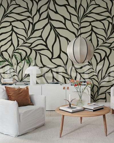 Tapet cu frunze negre stilizate într-un living modern