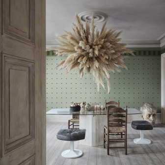 Tapet verde cu model geometric într-o sufragerie elegantă