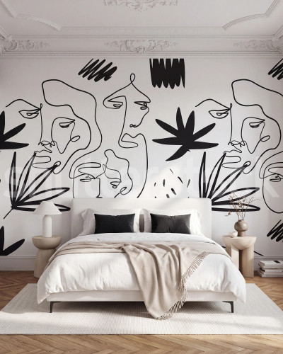 Fototapet cu un design de fețe abstracte în stil linie, pe un fundal de culoare grafit, aplicat pe peretele unui dormitor modern deasupra unui pat alb.