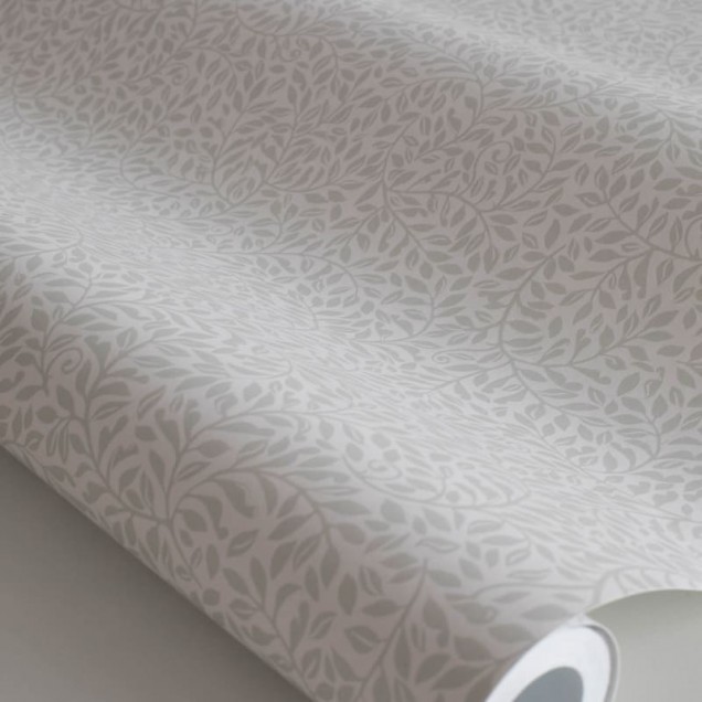 Tapet lavabil Bladverk Garden Green cu model discret de frunze mici, culoare verde deschis.