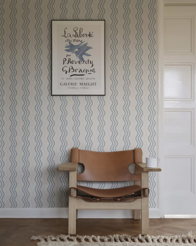 Tapet lavabil cu design modern, cu valuri în nuanțe de albastru deschis.
