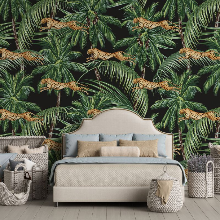 Jungle pattern wallpaper with cheetahs leaping through palm trees on a black background.