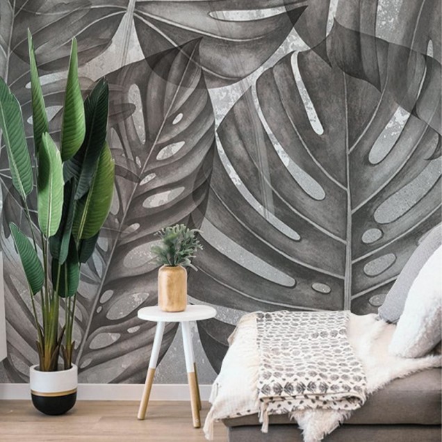 Tapet cu frunze mari de filodendron în nuanțe de gri, perfect pentru a adăuga o notă de eleganță și stil tropical în casa dumneavoastră.