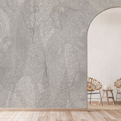 Tapet Nomadic wall grey, cu model floral subtil pe fundal gri cu aspect de beton crapat