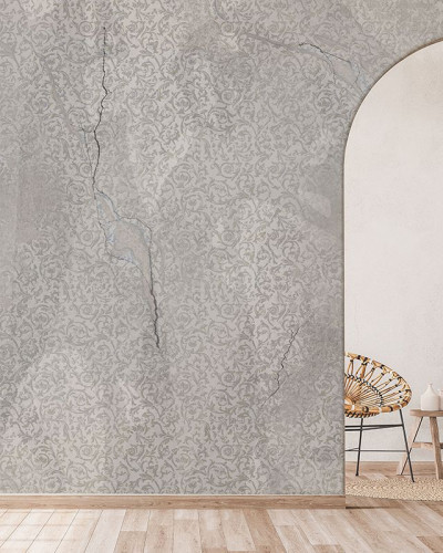 Tapet Nomadic wall grey, cu model floral subtil pe fundal gri cu aspect de beton crapat