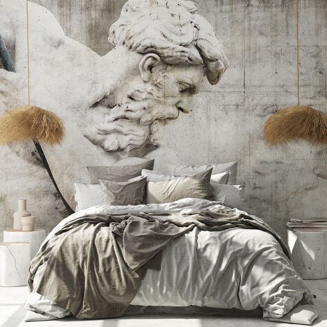 Tapet cu design minimalist, cu o imagine a unui cap de statuie antic, pe un fundal gri texturat