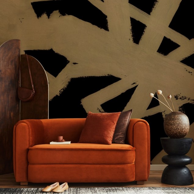 Tapet abstract Dreamscape Rose Gold Tapet abstract cu design modern, cu nuanțe de auriu și negru, prezentat într-un interior elegant.