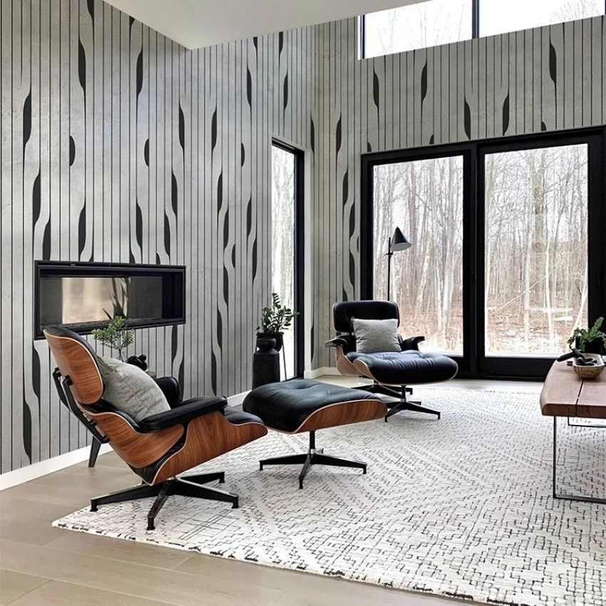 Tapet personalizat cu design abstract în nuanțe neutre, aplicat într-un dormitor modern.