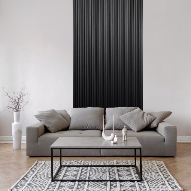 Panou decorativ riflat 3D negru într-un living modern