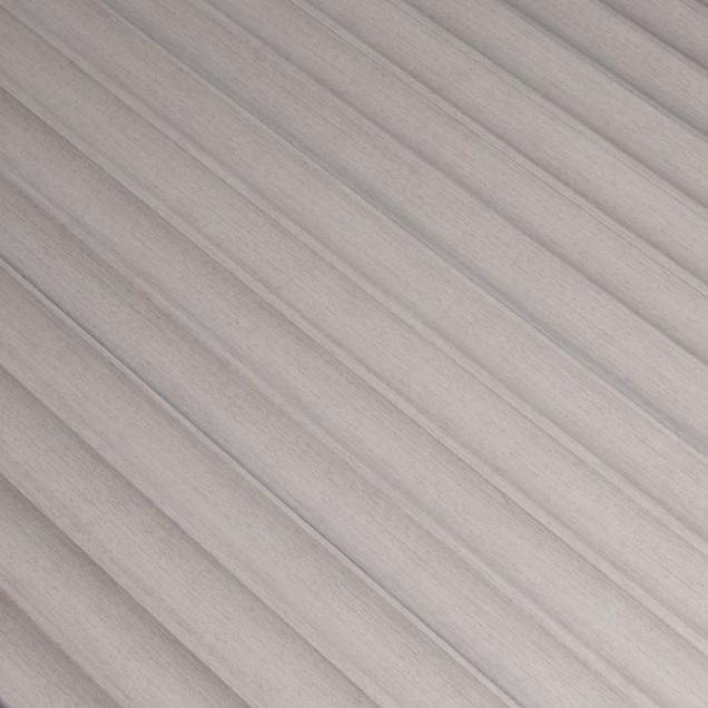 Panou decorativ riflat 3D gri într-un living modern