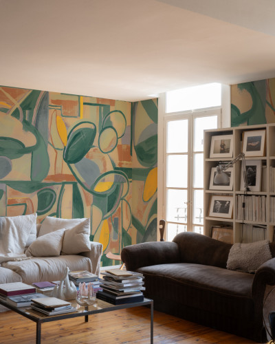 Tapet abstract verde cu nuanțe de galben și portocaliu, cu un design modern.