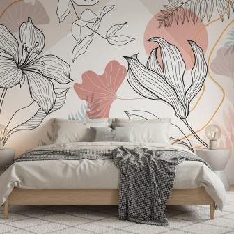 Dormitor modern decorat cu fototapet Gilded Earth Bloom Line, ce prezintă flori abstracte în linii negre, forme organice în nuanțe de ocru, roz și albastru, pat, noptiere și scaun verde.