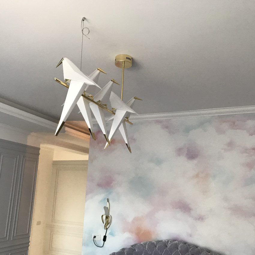 Tapet cu nori colorati in nuante pastelate de roz, albastru si portocaliu.